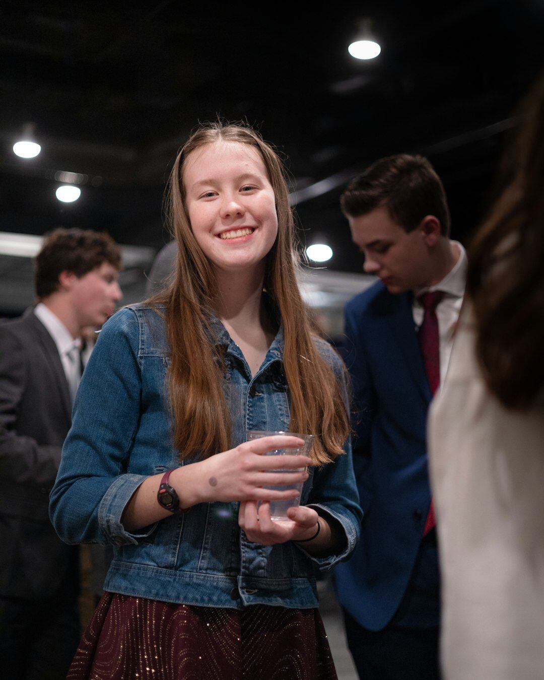 Professionals networking and talking at a business event